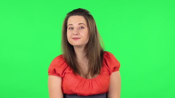 Portrait of Cute Girl Worrying in Expectation Then Smile and Proud of Herself. Green Screen