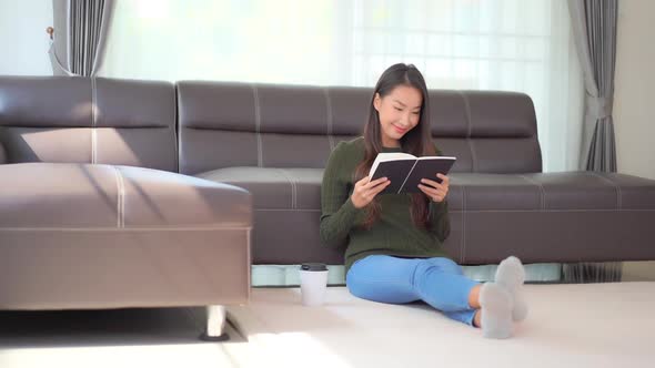 Young asian woman read book