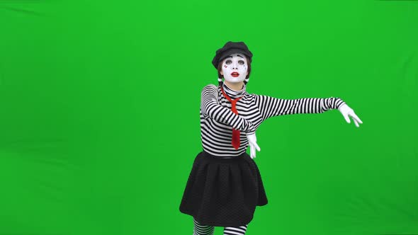 Mime Girl Acting Like She Skating on Ice