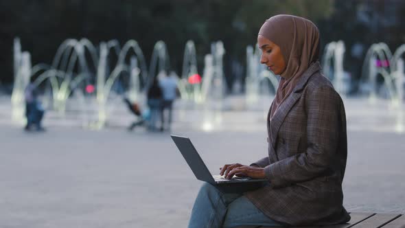 Busy Successful Muslim Student Girl in Hijab Young Islamic Business Woman Using Laptop App Working
