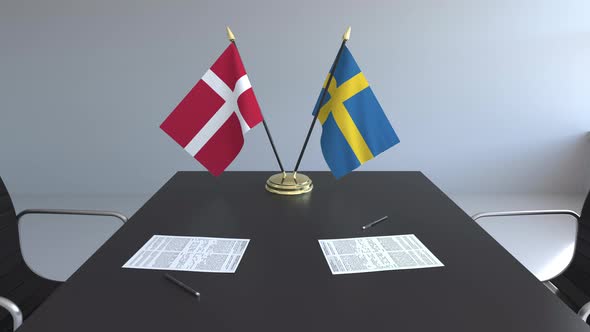 Flags of Denmark and Sweden on the Table alt