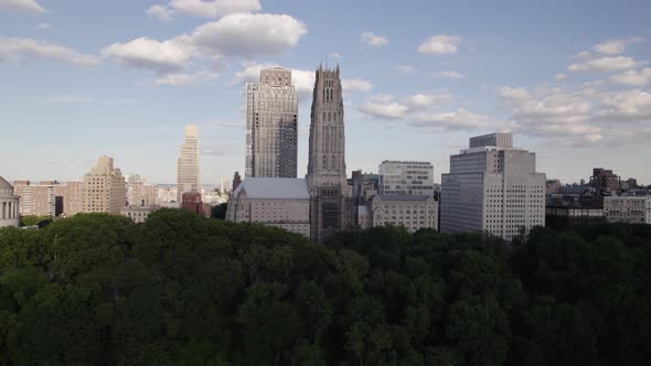 Aerial view in front of the Riverside Church, summer in NYC, USA - ascending, tilt drone shot