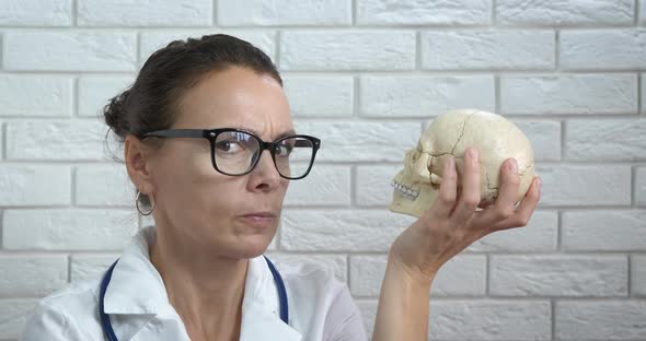 Medical Worker with Skull