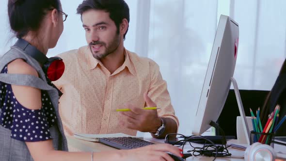 Creative Business People Group Having Conversation at Office Desk in Workplace