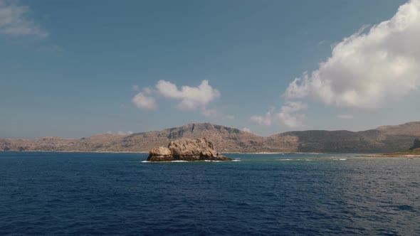 View On Rock In The Sea From Ship