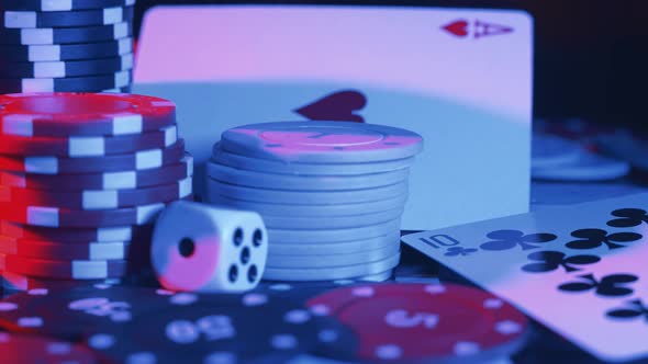 Casino Chips and Playing Cards in Motion