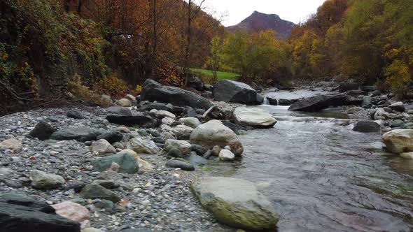 Autumn river in mountain forest