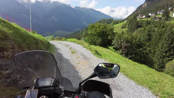 POV Biker Rides on Motorbike By Scenic Countryside Sunny Mountain Road Swiss Alp