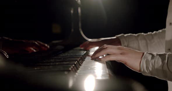 Professional Pianist Hands Plays Gentle Classical Music on a Grand Piano. Slow Motion