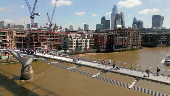 Aerial Footage People On The Millennium Bridge London Uk