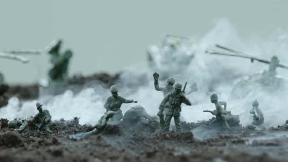 Battlefield with toy soldiers after explosion, Ultra Slow Motion