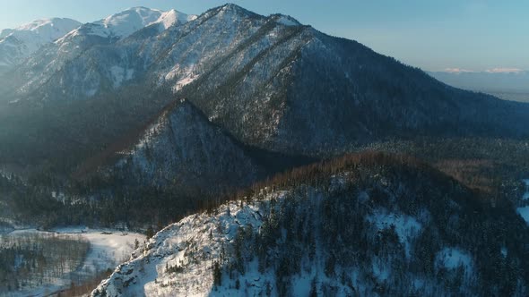 Mountains in Winter Old Ridge Covered with Wood and Snow