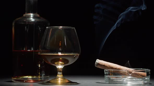 Brandy or Whiskey and Cigar Closeup