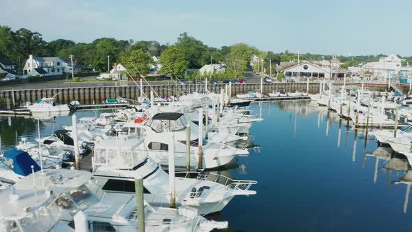 Sunrise Aerial Drone Flyover of Quiet Marina (Norwalk, Connecticut)