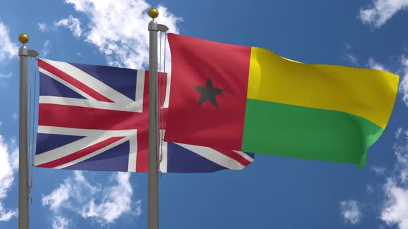 United Kingdom Flag Vs Guinea Bissau Flag On Flagpole