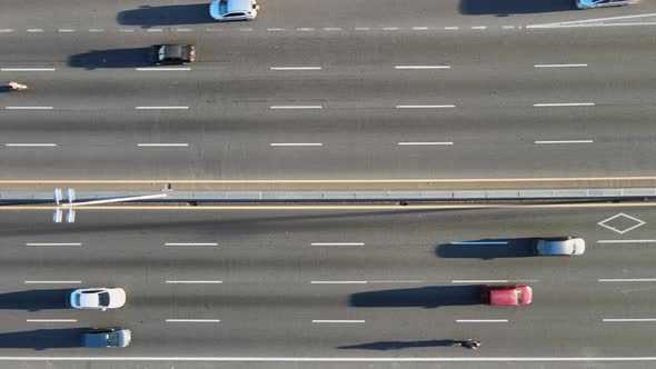 Aerial overhead view of traffic on highway on sunny day in Argentina