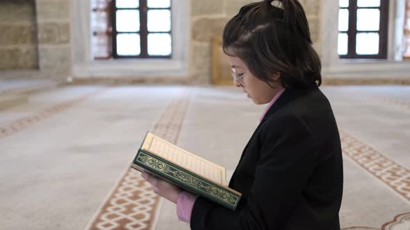 Boy Reading Quran