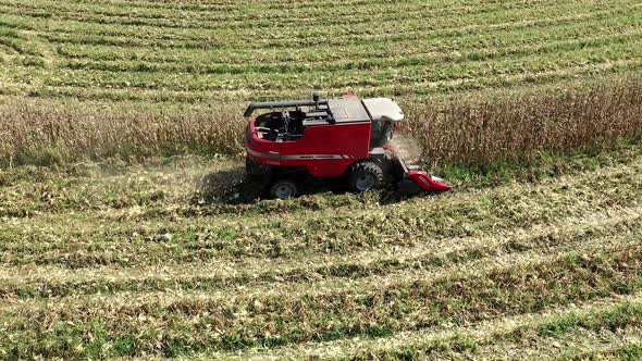 Tractor at rural landscape aerial view. Nature scenery