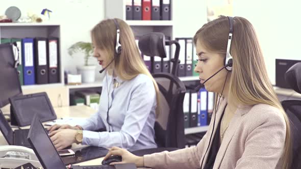 Call Center Agents Speaking with Customer