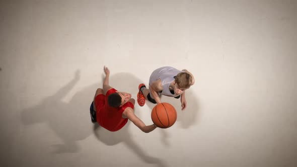 Top View of Throwin of the Ball Before the Start of the Game in Basketball Competition