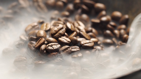 Fragrant Coffee Beans are Roasted in a Frying Pan