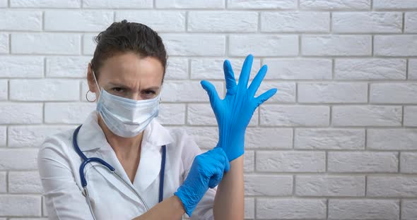 Medical Worker in Latex Gloves