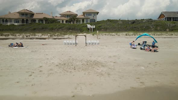 Beach wedding venue awaiting guests Emerald Isle North Carolina Aerial tracking outwards