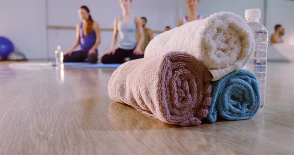 Close-up of towel and water bottle