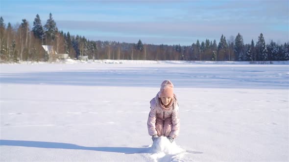 Child Skiing in the Mountains. Winter Sport for Kids.