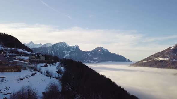 Straight flight far above the fog in Switzerland.