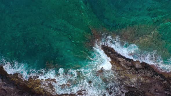 Top View of a Deserted Coast. Rocky Shore of the Island of Tenerife. Aerial Drone Footage of Ocean