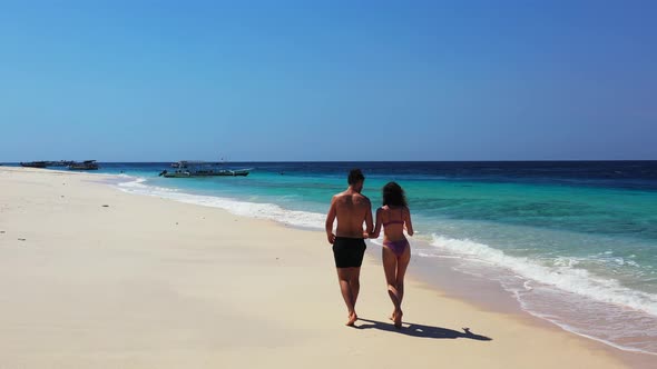 Beautiful Man and Woman After Marriage in Love Enjoy Life on Beach on Sunny White Sandy 