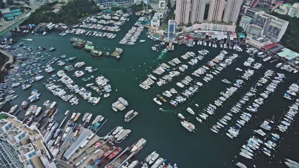 Panoramic aerial view of typhoon shelter made with hundreds of boats in Aberdeen, Hong Kong.