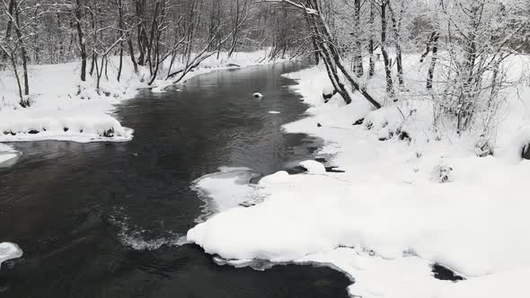 Wonderful Winter Landscape with a Small River Aerial View