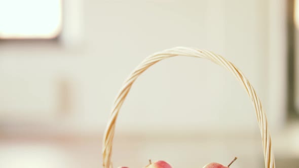 Ripe Apples in Wicker Basket on Wooden Table 38