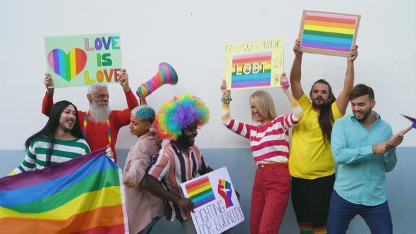Happy Multiracial people celebrating at gay pride festival