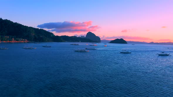 Sail Boats at Sunset on the Sea Lagoon on Corong Beach in El Nido, Palawan, Philippines