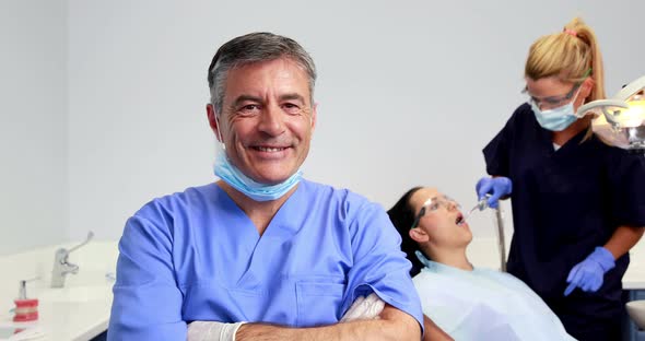 Friendly dentist smiling at camera