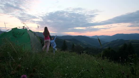 Girlfriend Girls are Photographed at Sunset in the Mountains