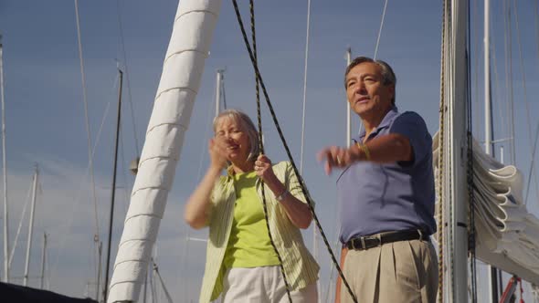 Senior couple on sailboat together. Shot on RED EPIC for high quality 4K, UHD, Ultra HD resolution.