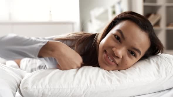 African Girl Lying in Bed