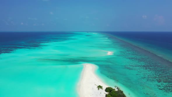 Aerial drone scenery of marine seashore beach vacation by transparent water with white sand backgrou