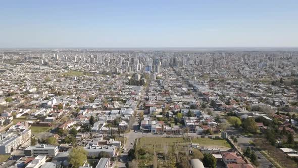 Aerial Drone shot from above the suburbs, going downtown, in Bahía Blanca, Argentina