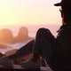 female model looking at the horizon with her marked silhouette, looking at pichilemu - VideoHive Item for Sale