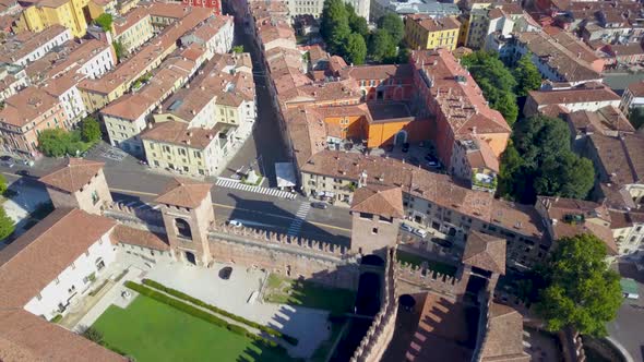 Verona, Italy: Aerial view of Castelvecchio Castle.Drone flies over the old city. Aerial video in 4K