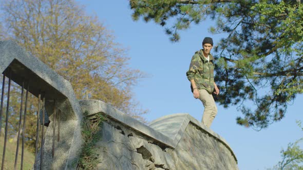 Skating on a concrete railing alt