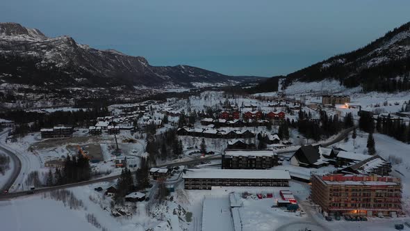 Late evening aerial in Hemsedal Norway - Loads of leisure homes and apartment building under constru