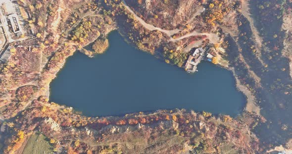 View of the Artificial Lake in a Flooded Part of a Granite Quarry Lined with Stone