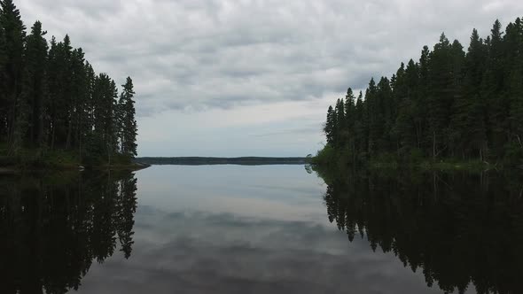 Forests and lake on a cloudy day