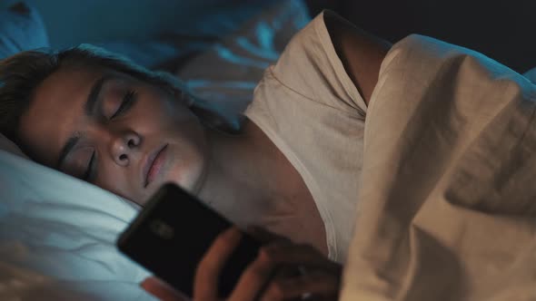 Night Online Tired Woman Falling Asleep with Phone